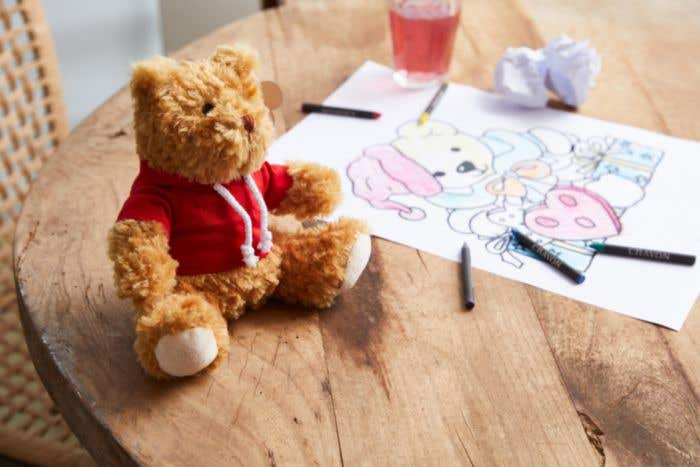 Ourson en peluche avec capuche